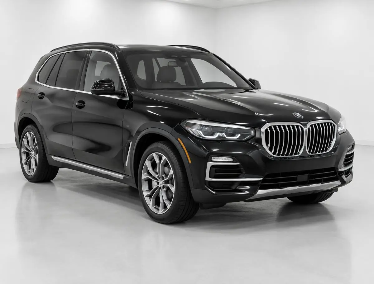 Black luxury SUV in a professional vehicle photo bay